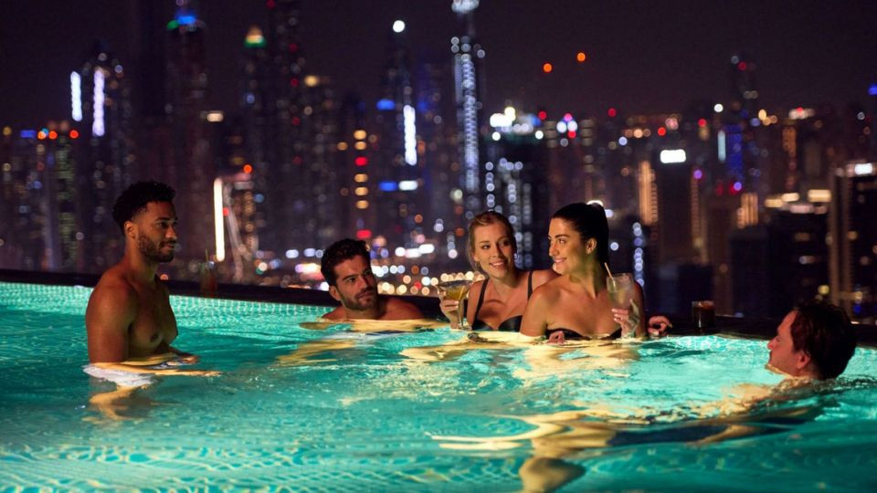 Aura evening pool experience 2025 United Arab Emirates